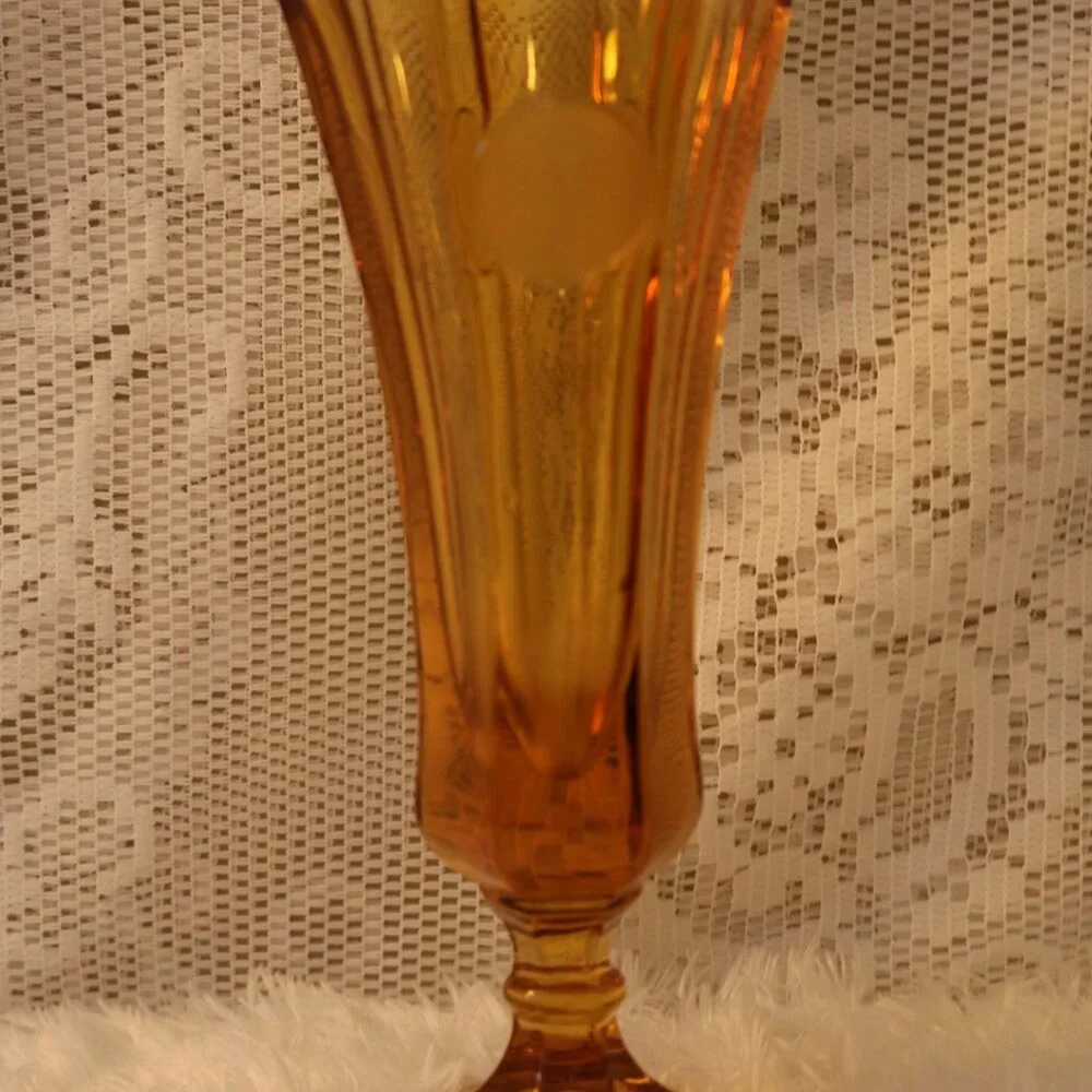This Fostoria Amber vase coin glass vintage piece from the 1970s